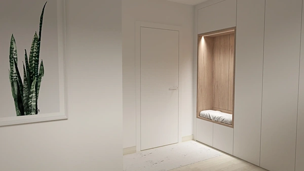 Recibidor minimalista con armario blanco integrado, banqueta incorporada y detalles en color madera, ofreciendo una solución de almacenaje discreta y chic.