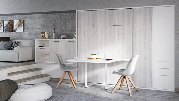 Maximiza tu espacio con esta cama abatible vertical que se transforma con facilidad, brindando una solución práctica para apartamentos compactos. La mesa de comedor incorporada es un toque elegante y funcional para disfrutar de tus comidas con estilo y comodidad.